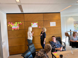 Sessie met post-its en overleg voor CS Opleidingen